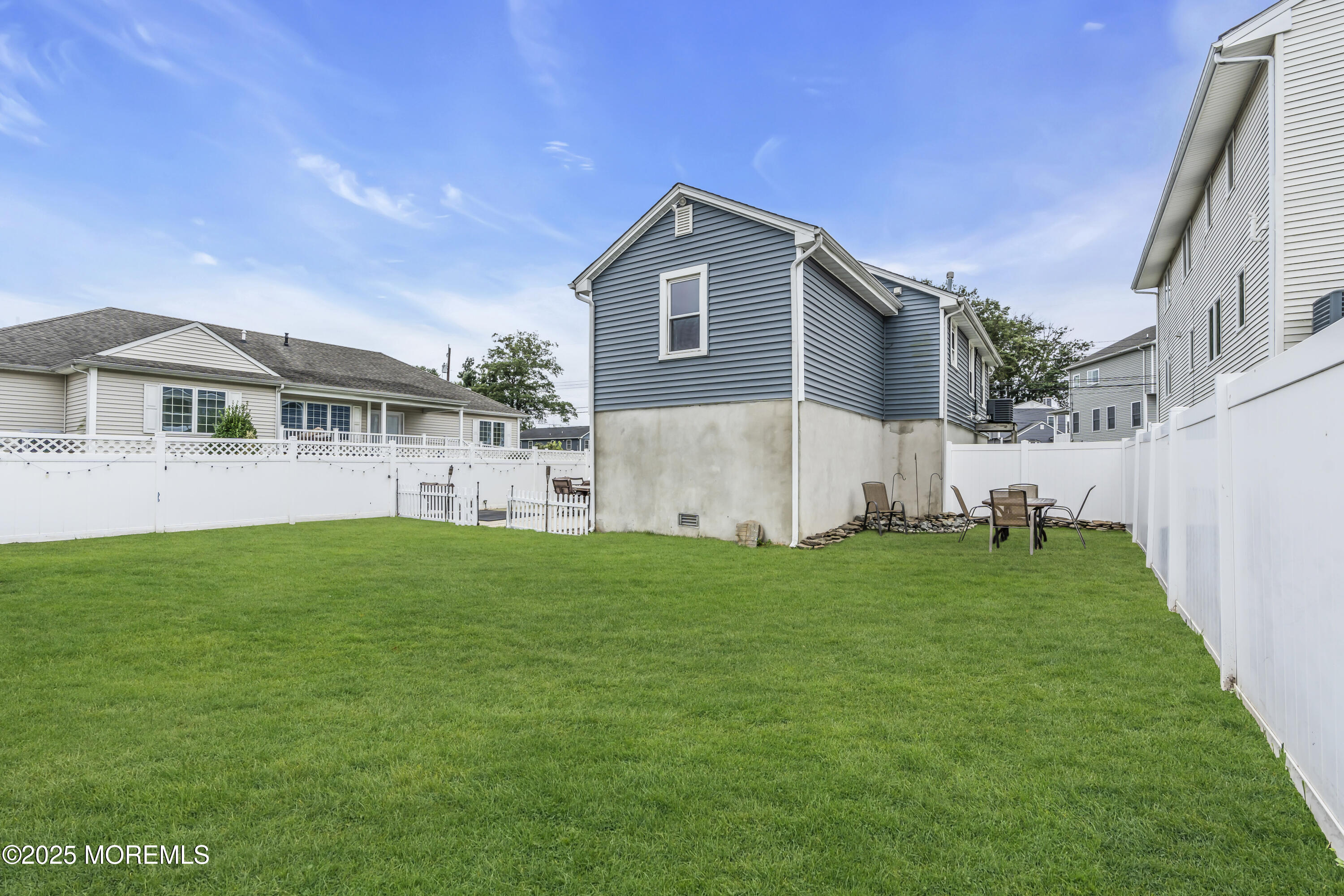 825 Lorillard Avenue Union Beach, NJ 07735 - Photo 19 of 22 a view of an house with backyard and garden