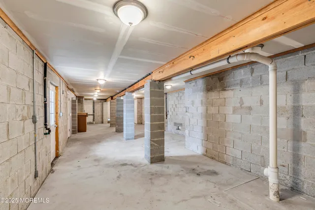 a view of a big room with wooden walls