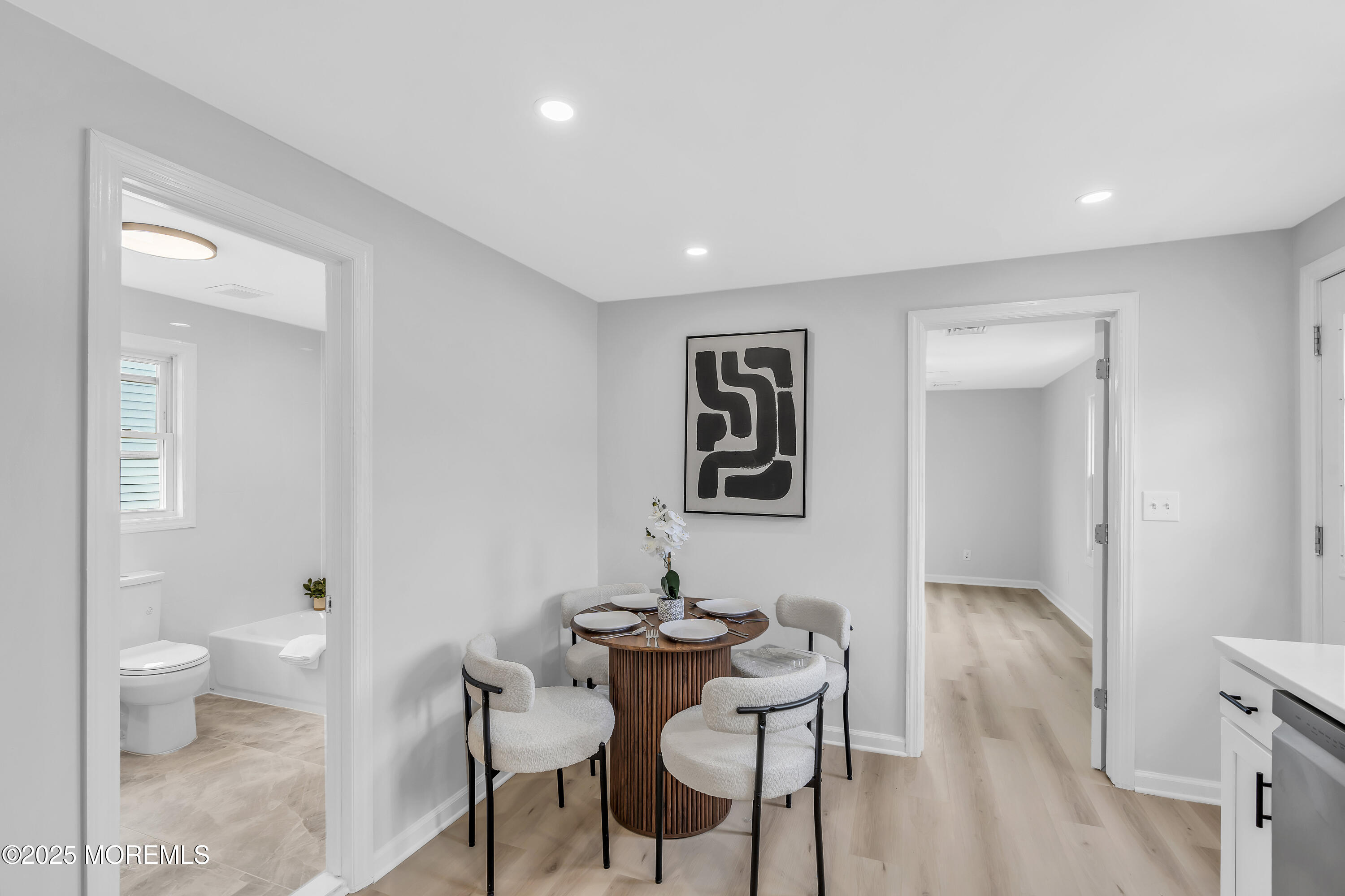 825 Lorillard Avenue Union Beach, NJ 07735 - Photo 7 of 22 a view of a livingroom with furniture and wooden floor