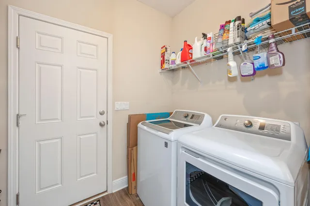 a utility room with dryer and washer