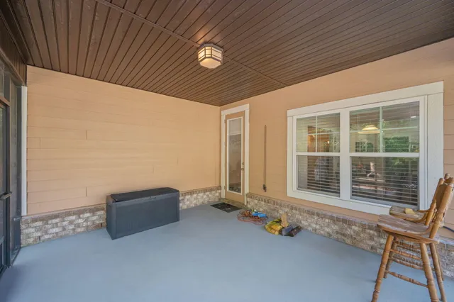 a backyard of a house with seating space