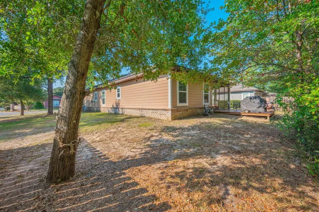 a house with trees in front of it