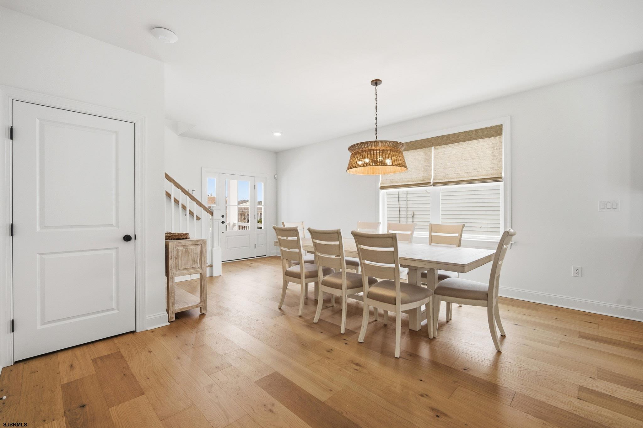 150 South 9th Brigantine, NJ 08203 - Photo 5 of 32 a view of a dining room with furniture window and wooden floor