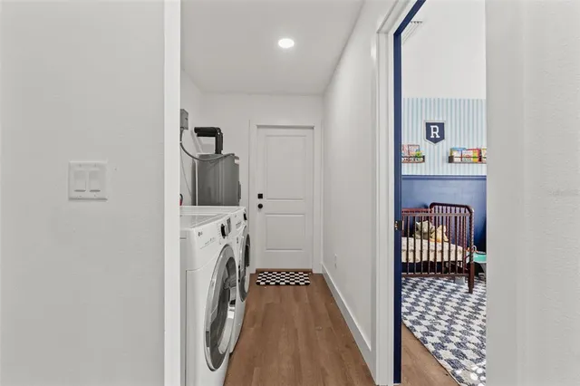 a view of a hallway with a dinning area