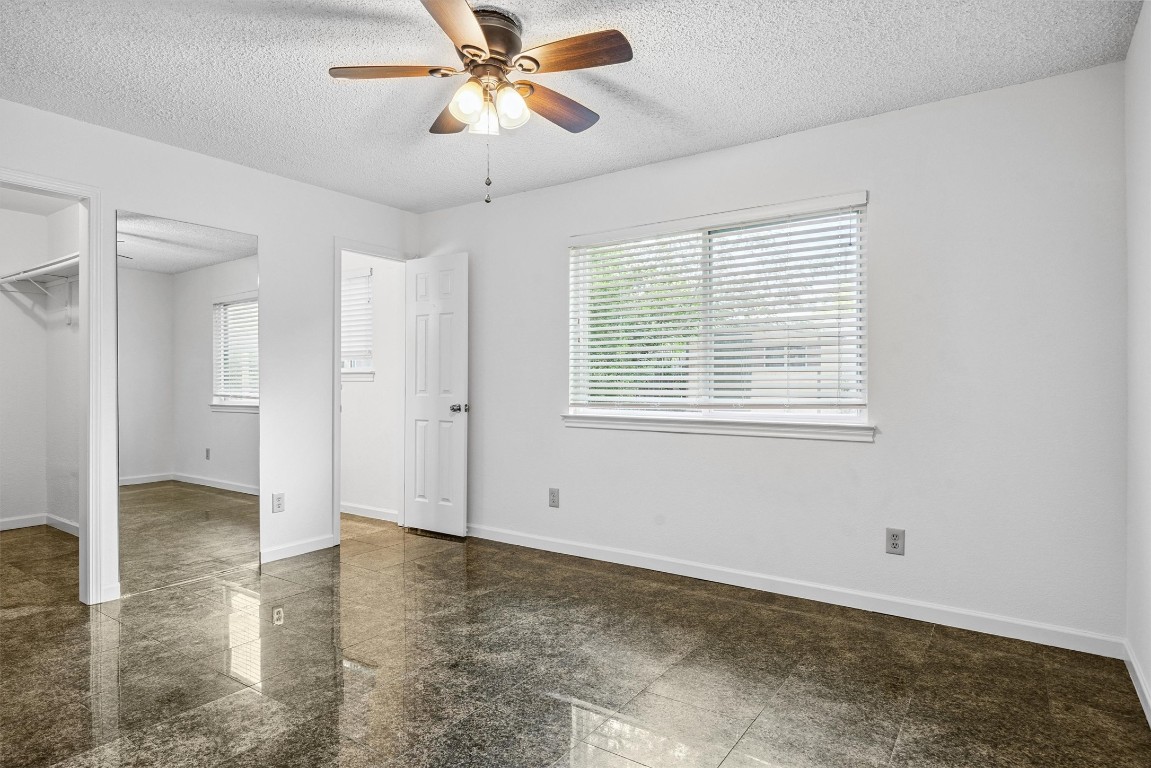 6308 Shadow Bend Austin, TX 78745 - Photo 15 of 35 a view of an empty room with a window