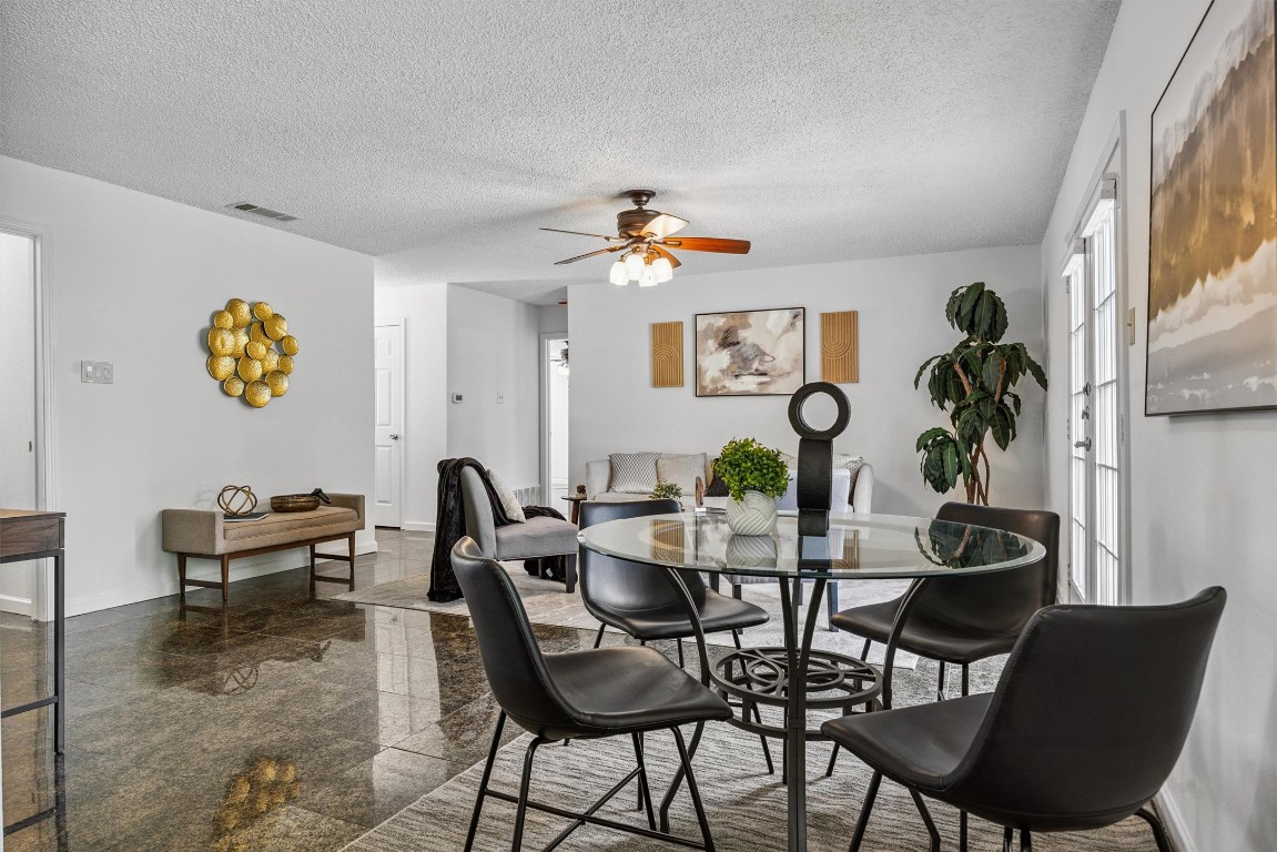 6308 Shadow Bend Austin, TX 78745 - Photo 4 of 35 a view of a dining room with furniture and chandelier