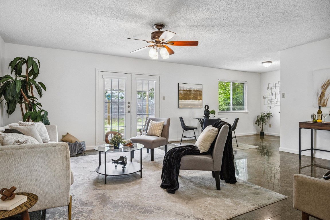 6308 Shadow Bend Austin, TX 78745 - Photo 6 of 35 a living room with furniture and a large window