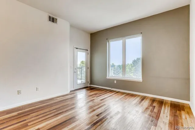 a view of an empty room and window