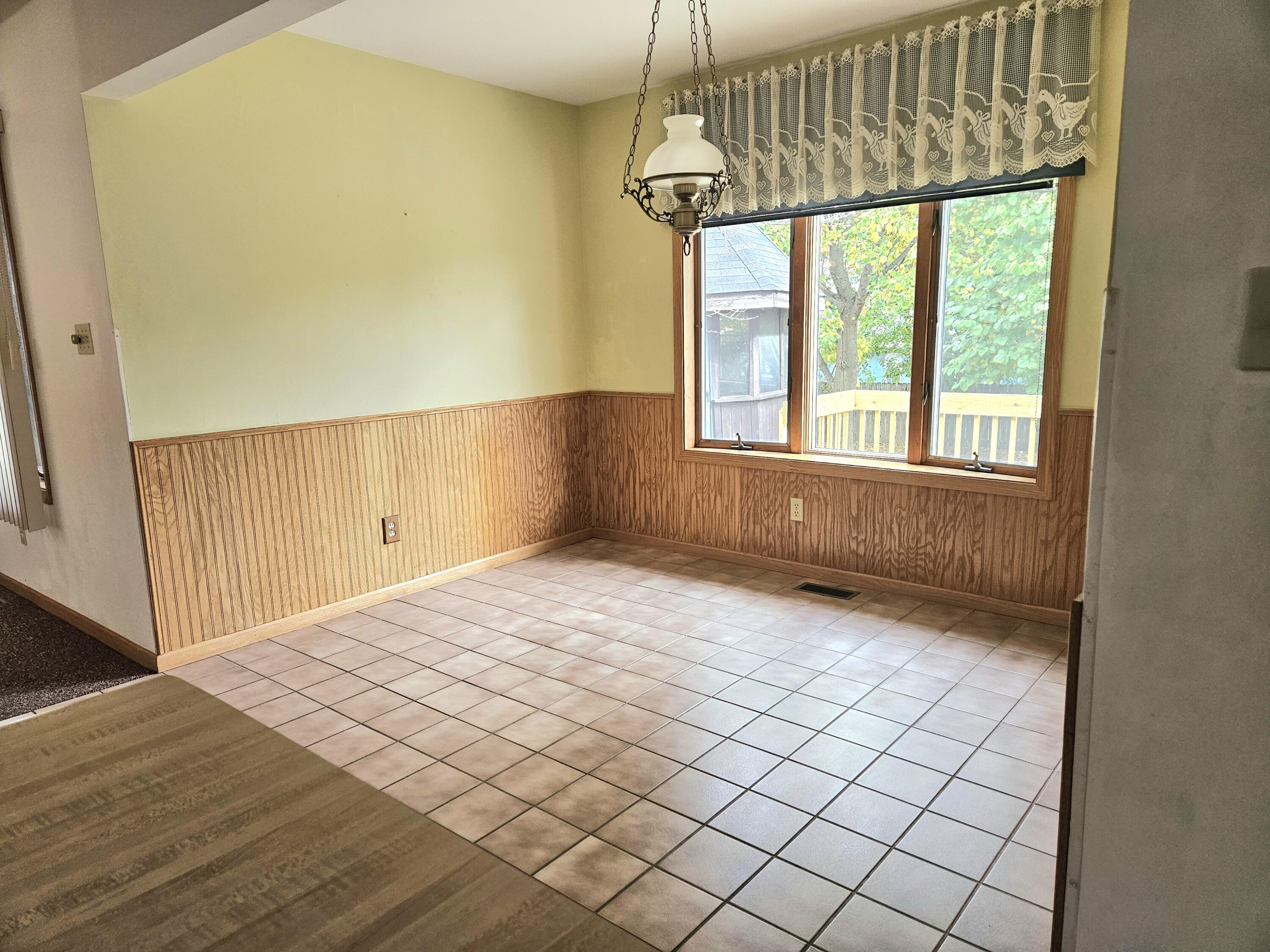 680 Meadow Lane Crown Point, IN 46307 - Photo 16 of 46 a view of an empty room and window