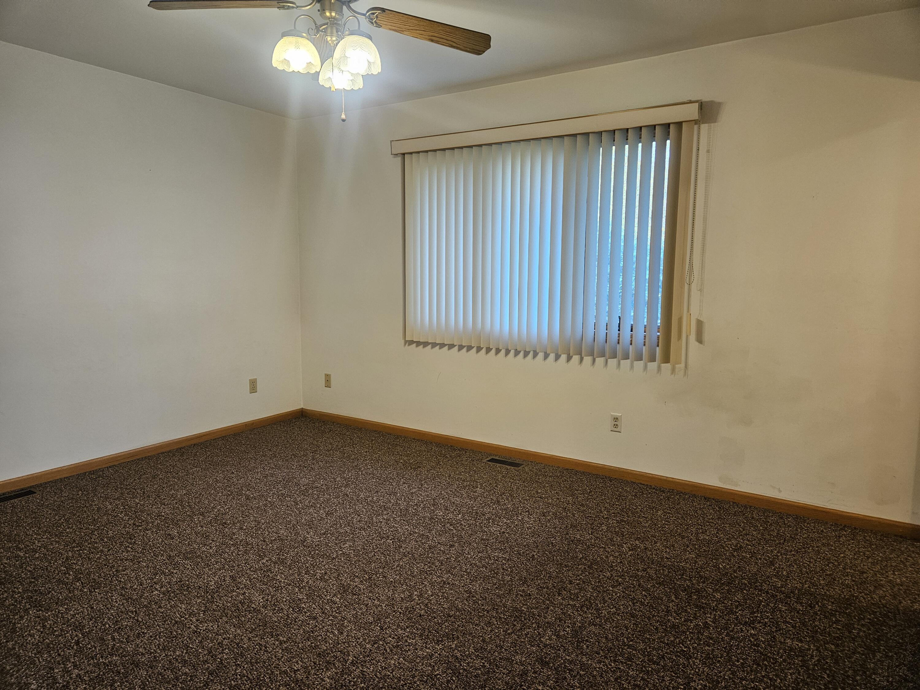 680 Meadow Lane Crown Point, IN 46307 - Photo 18 of 46 an empty room with a window