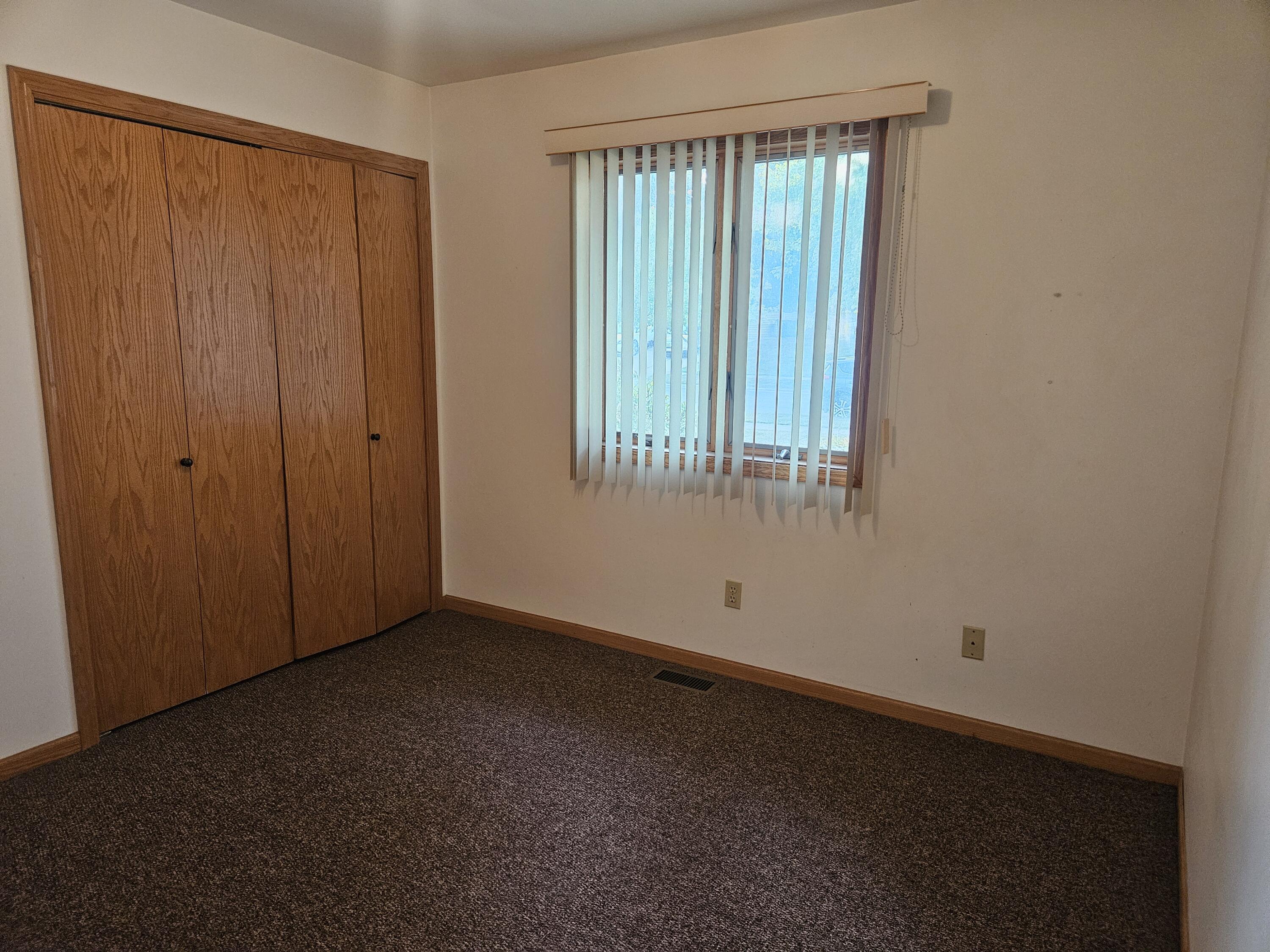 680 Meadow Lane Crown Point, IN 46307 - Photo 23 of 46 an empty room with windows