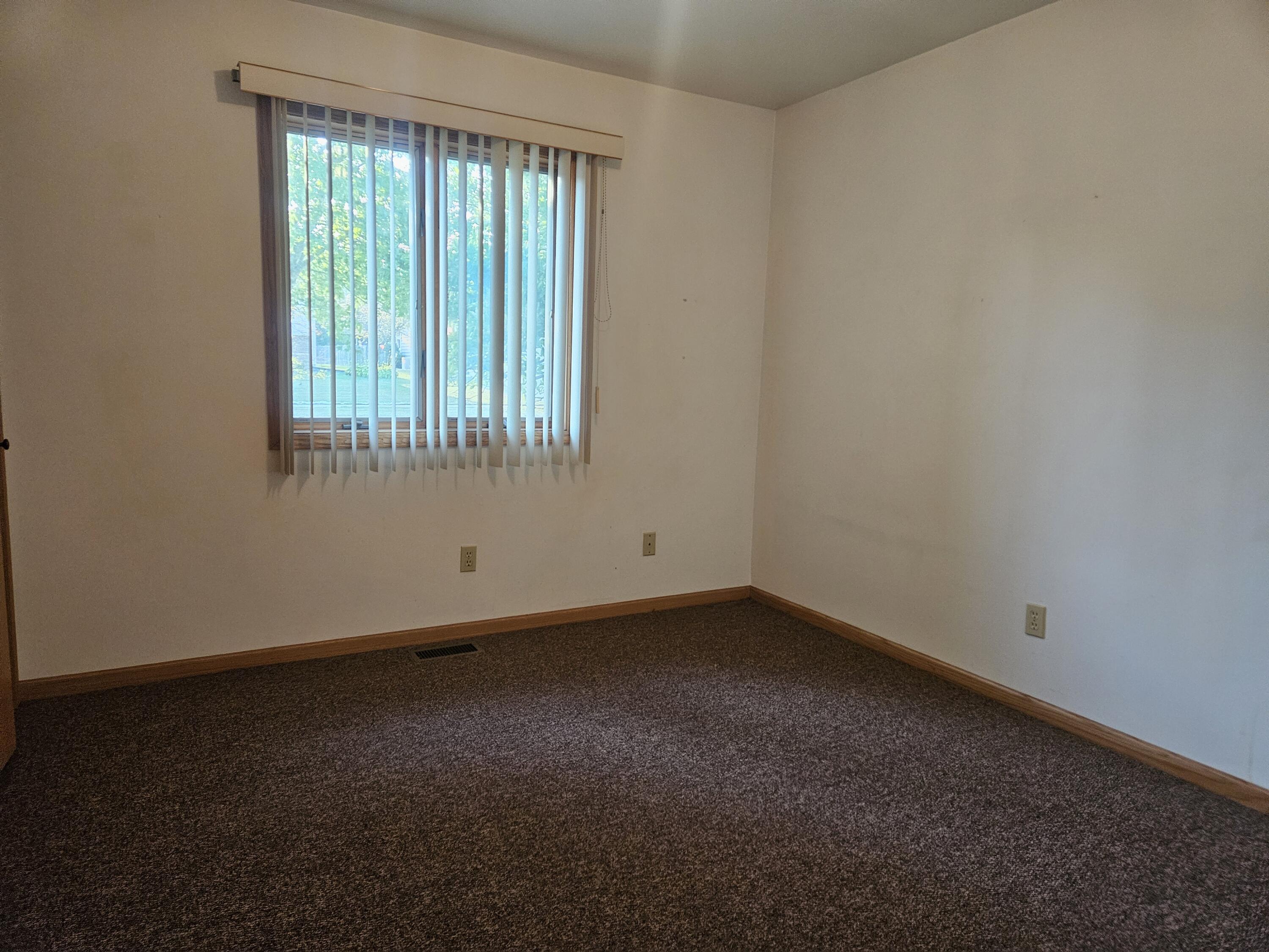 680 Meadow Lane Crown Point, IN 46307 - Photo 24 of 46 an empty room with a window