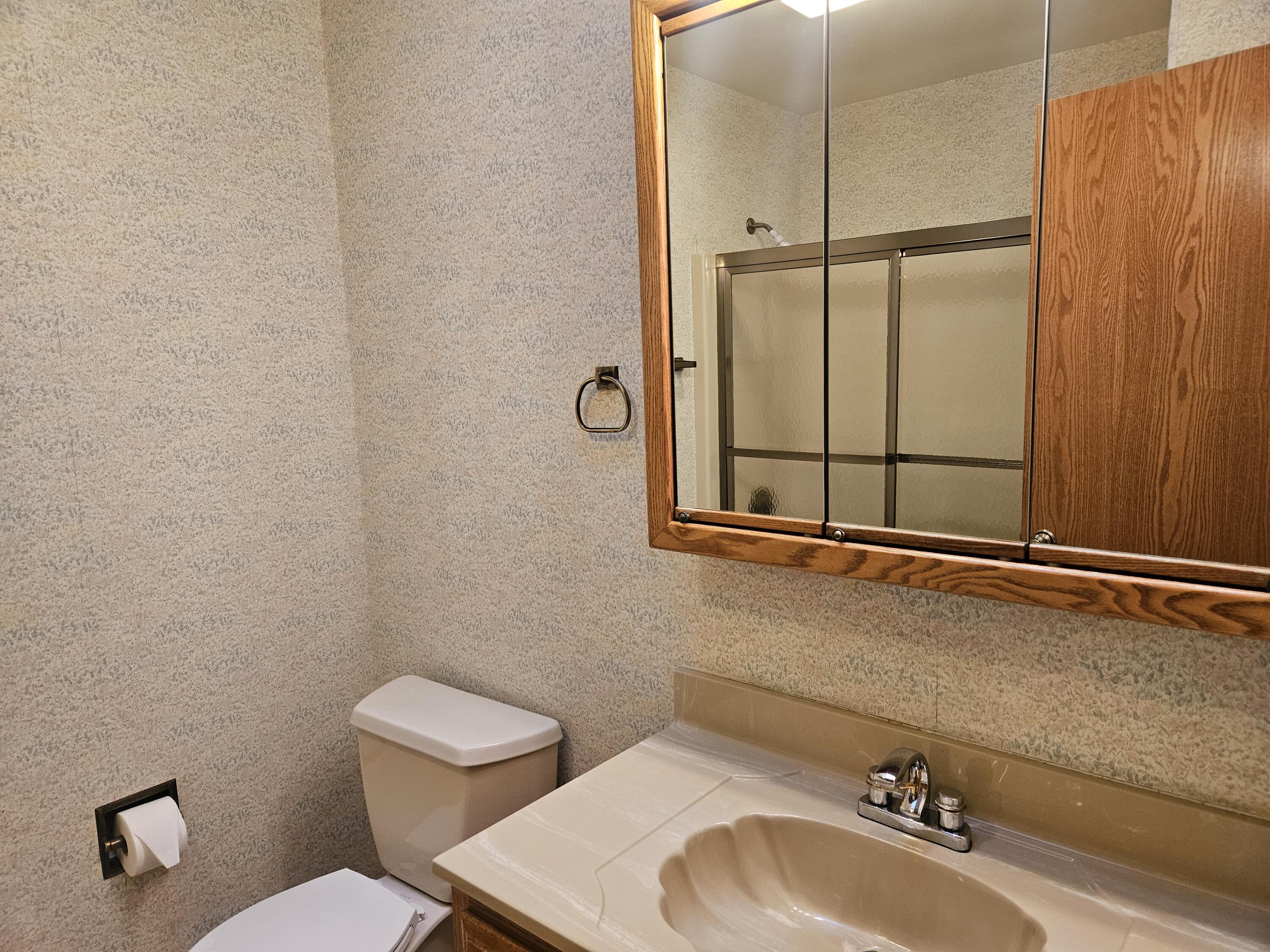 680 Meadow Lane Crown Point, IN 46307 - Photo 30 of 46 a bathroom with a sink toilet and mirror