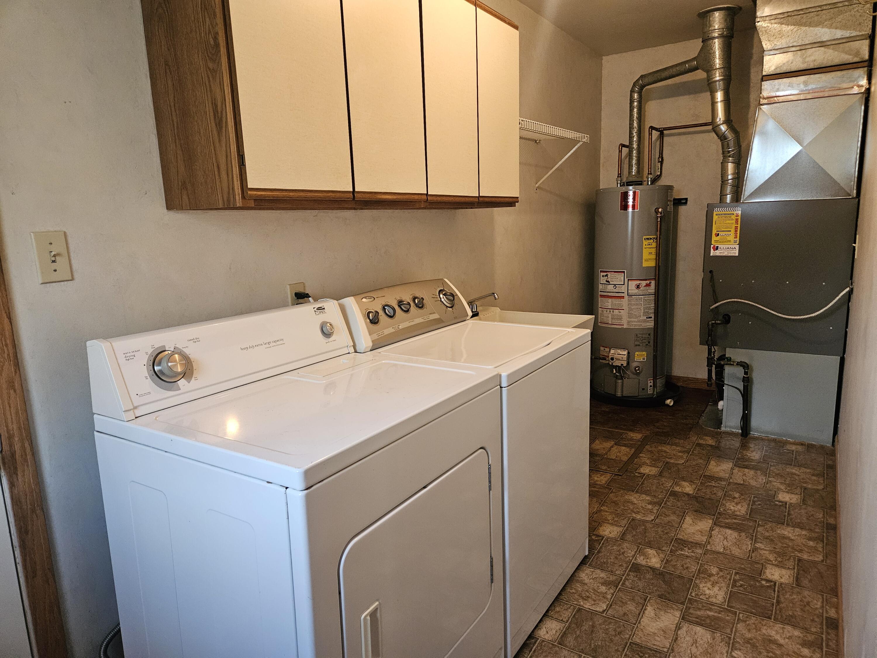 680 Meadow Lane Crown Point, IN 46307 - Photo 34 of 46 a utility room with dryer and washer