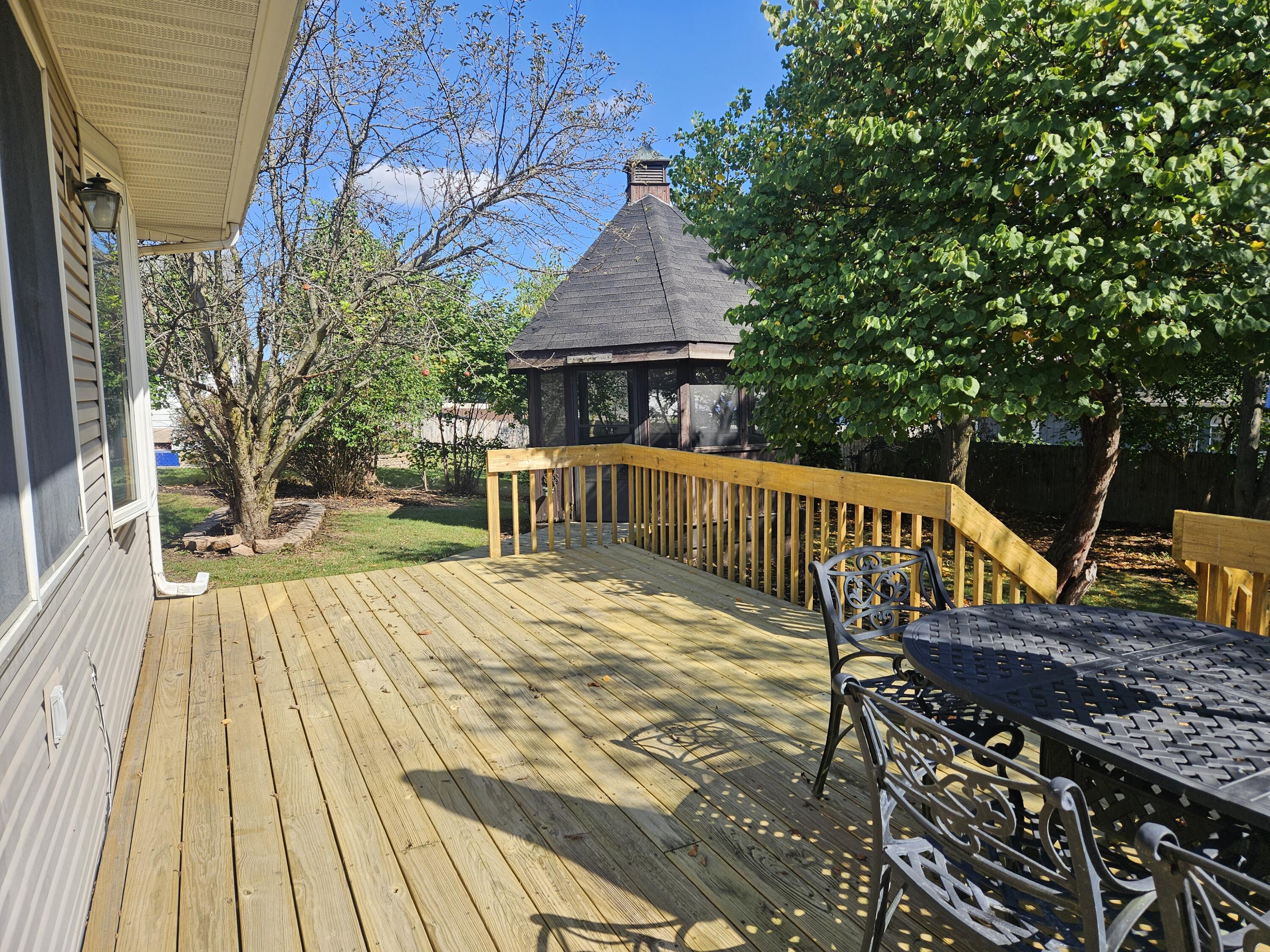 680 Meadow Lane Crown Point, IN 46307 - Photo 39 of 46 a view of balcony with wooden floor and outdoor space