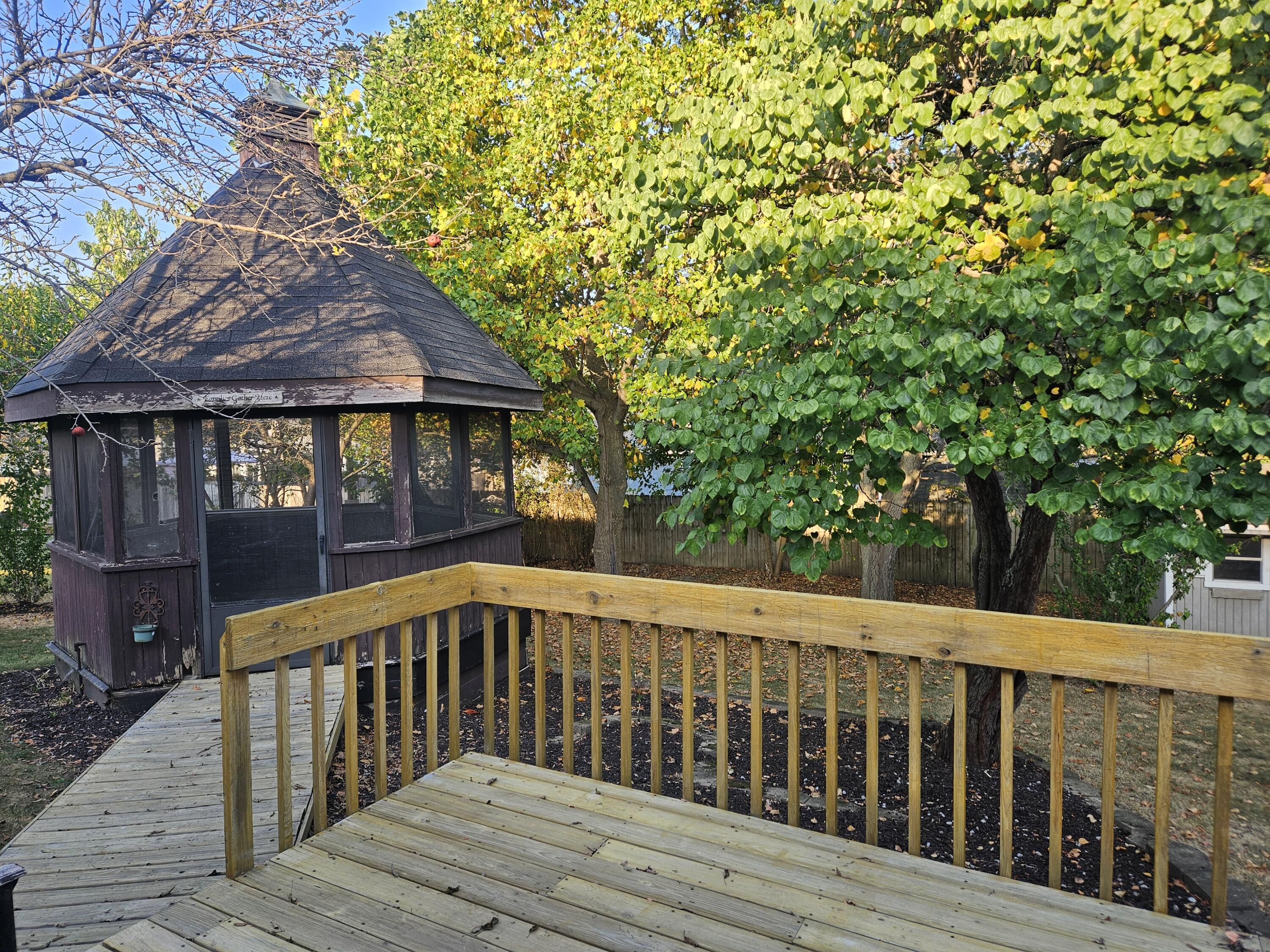 680 Meadow Lane Crown Point, IN 46307 - Photo 41 of 46 a balcony with wooden floor and fence