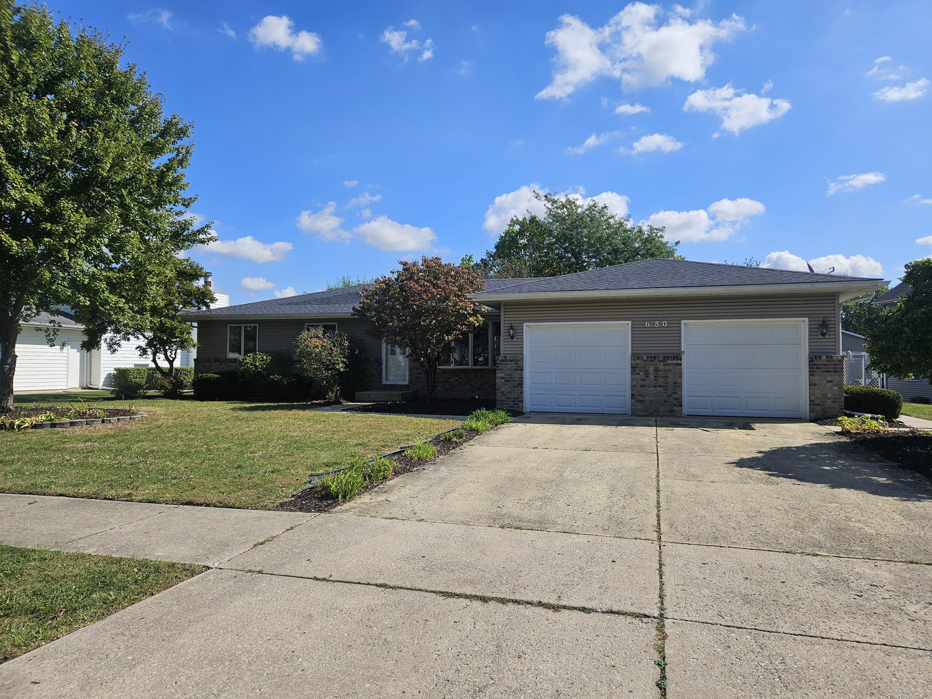 680 Meadow Lane Crown Point, IN 46307 - Photo 45 of 46 a house view with a garden space