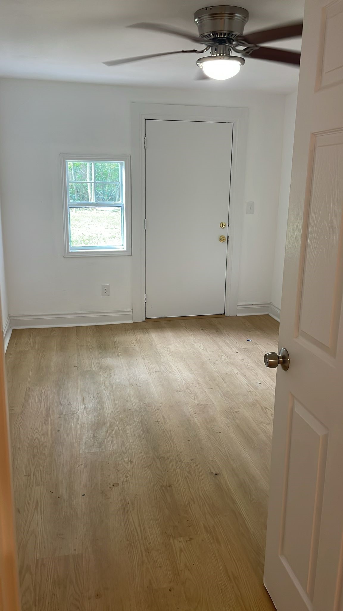 3518 Schurmier Road, Unit A Houston, TX 77047 - Photo 9 of 12 an empty room with a empty space and windows