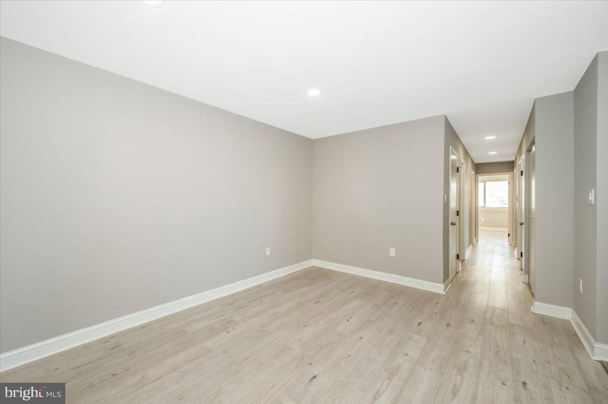 11368 Cherry Hill Road, Unit 1Q204 Beltsville, MD 20705 - Photo 20 of 46 wooden floor in an empty room