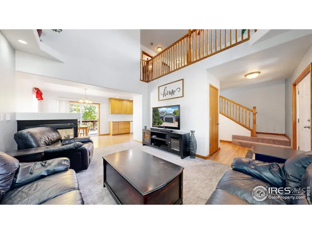 a bathroom with a sink vanity mirror and toilet