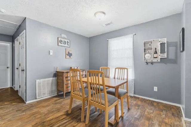 a view of a dining room with furniture