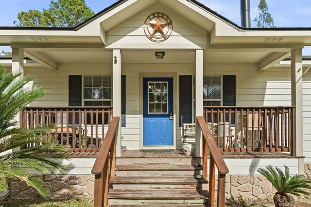 a front view of a house with a balcony