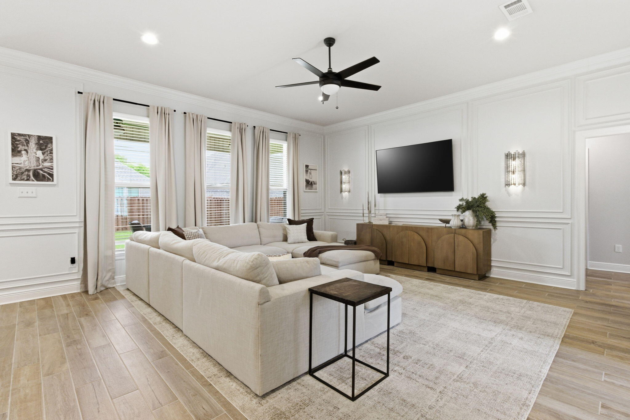 140 Flora Lane Freeport, FL 32439 - Photo 11 of 77 a living room with furniture and a flat screen tv
