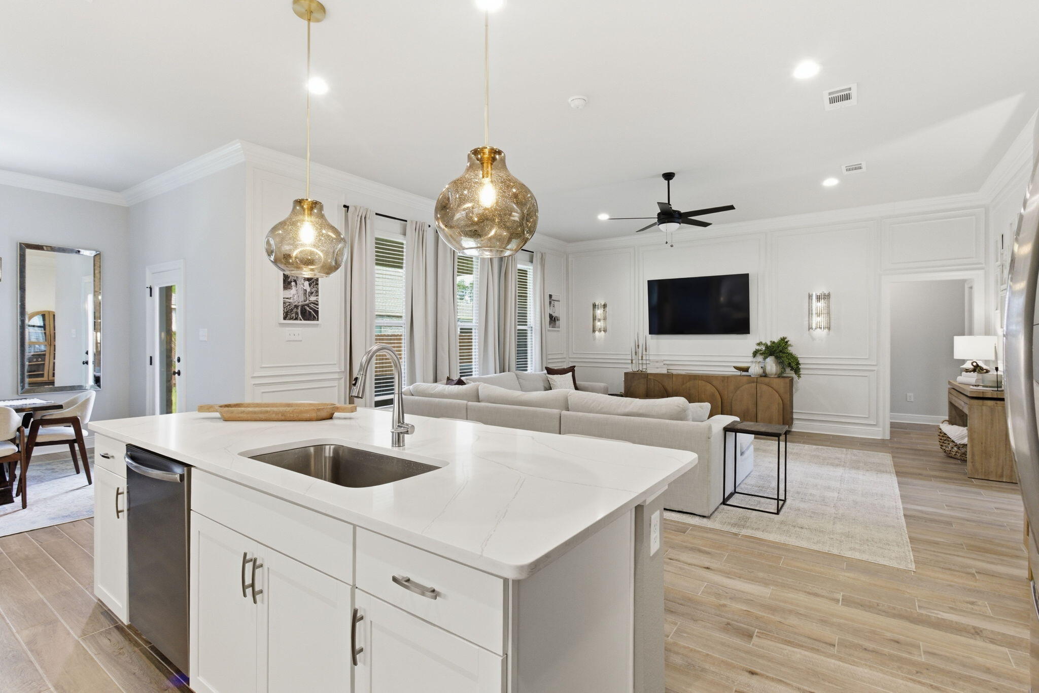 140 Flora Lane Freeport, FL 32439 - Photo 12 of 77 a view of living room kitchen island stainless steel appliances and living room view