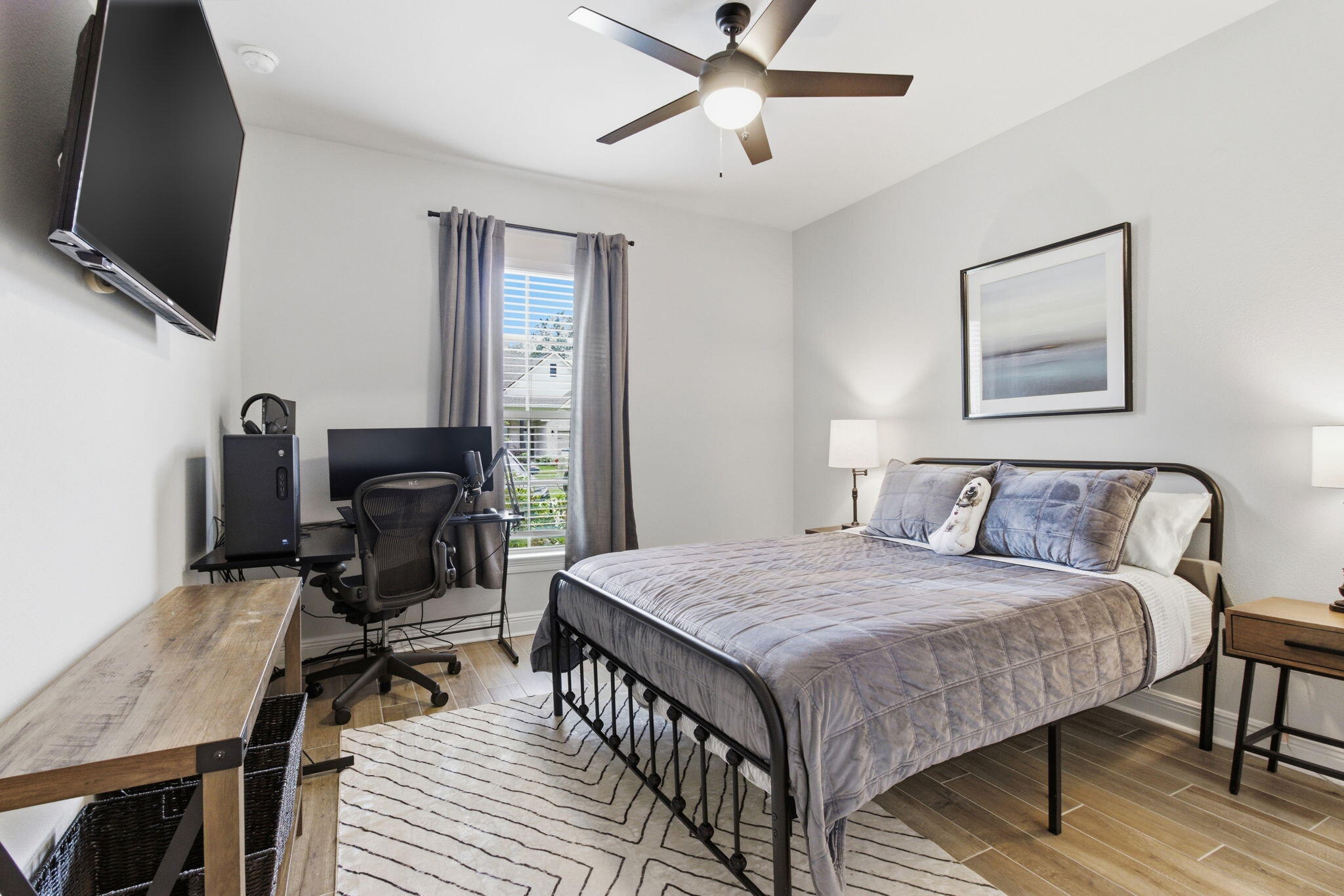 140 Flora Lane Freeport, FL 32439 - Photo 22 of 77 a bedroom with a bed a desk and chair