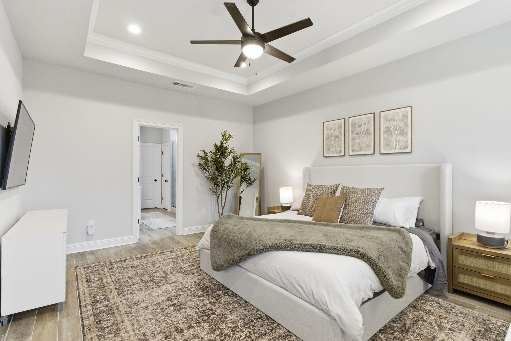 140 Flora Lane Freeport, FL 32439 - Photo 28 of 77 a bedroom with a large bed and a couch