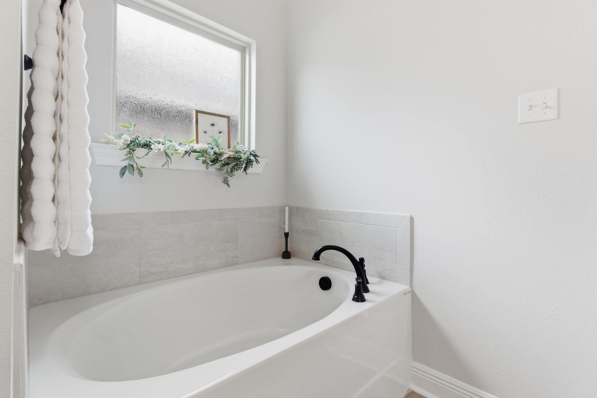 140 Flora Lane Freeport, FL 32439 - Photo 33 of 77 a white bath tub sitting next to a shower