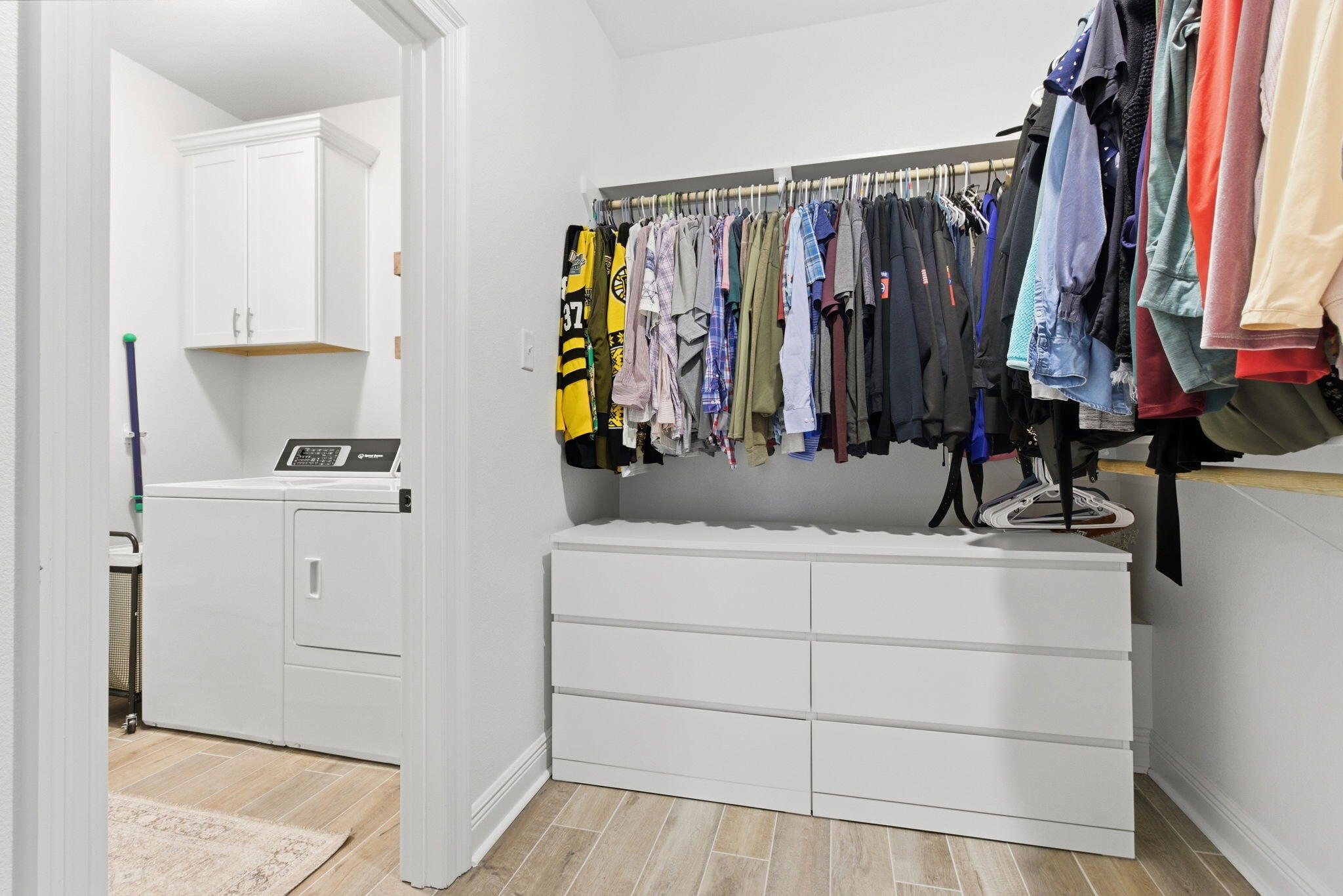 140 Flora Lane Freeport, FL 32439 - Photo 37 of 77 a view of walk in closet with clothes and shoes