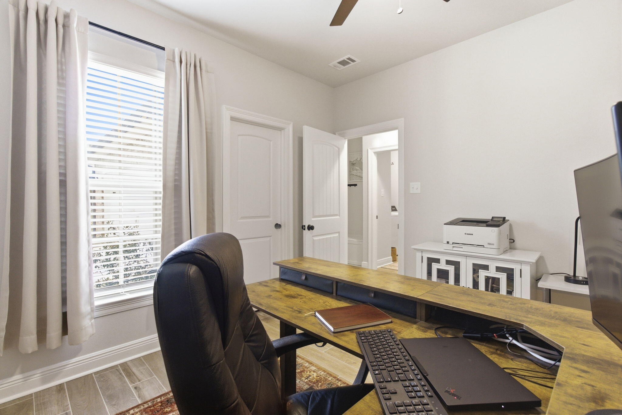 140 Flora Lane Freeport, FL 32439 - Photo 41 of 77 a living room with furniture and a window