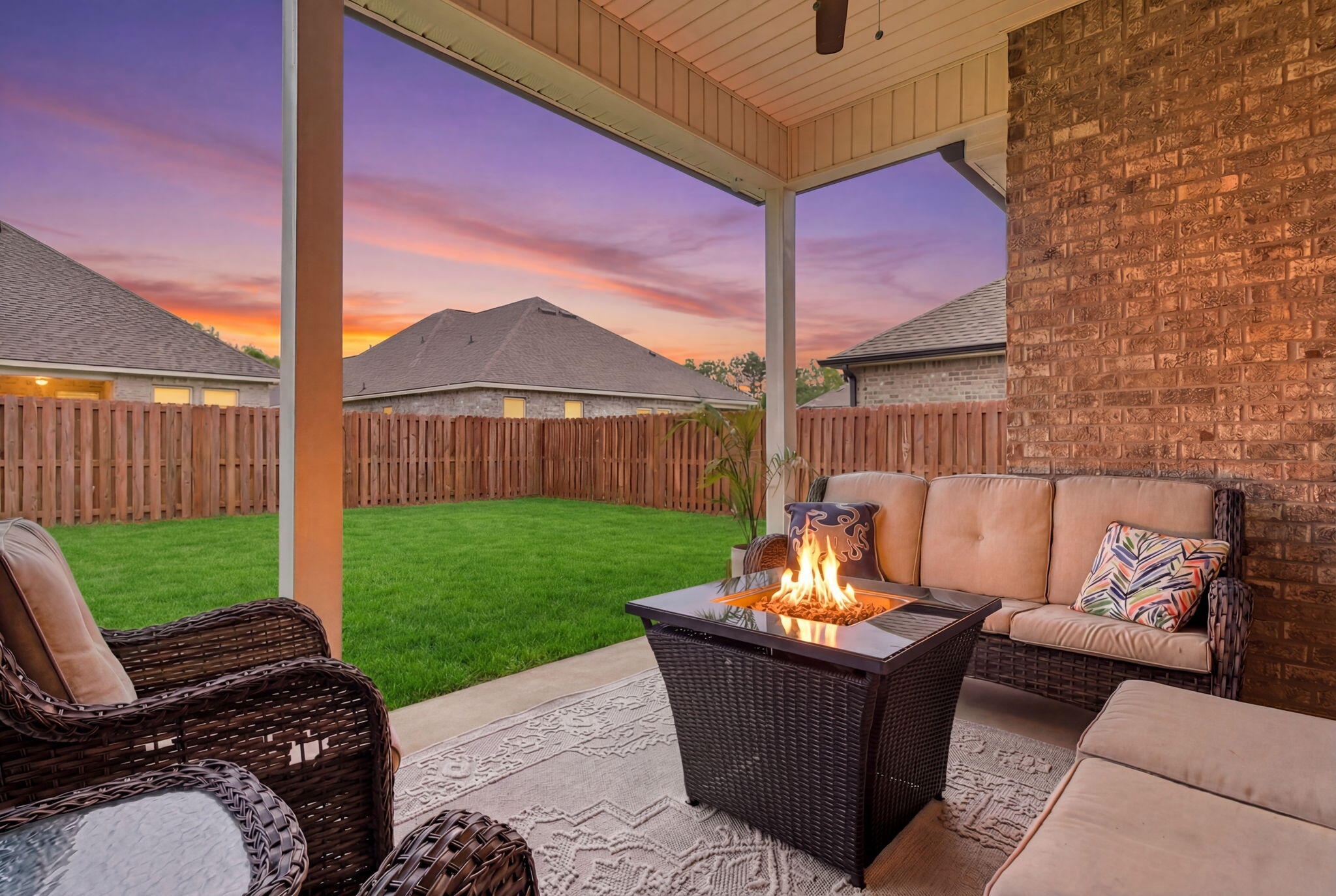 140 Flora Lane Freeport, FL 32439 - Photo 43 of 77 a view of a backyard with couches table and chairs