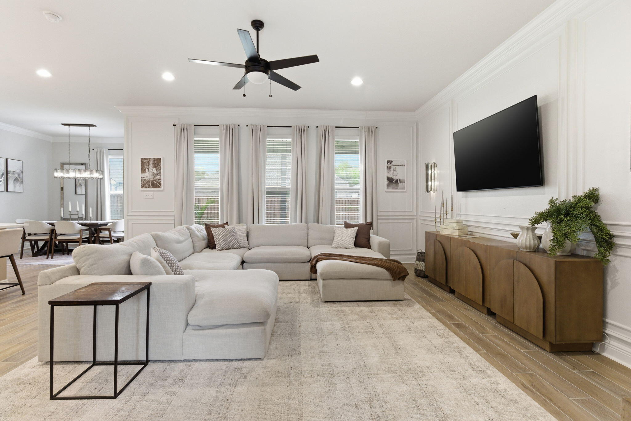140 Flora Lane Freeport, FL 32439 - Photo 7 of 77 a living room with furniture and a flat screen tv