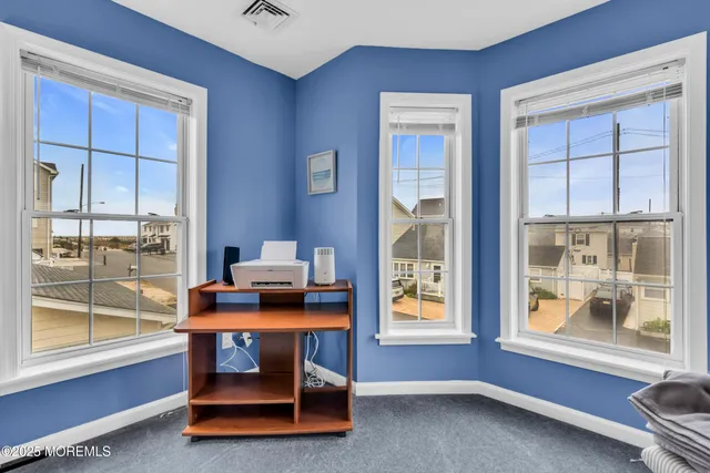 a bathroom with a sink double vanity and a mirror