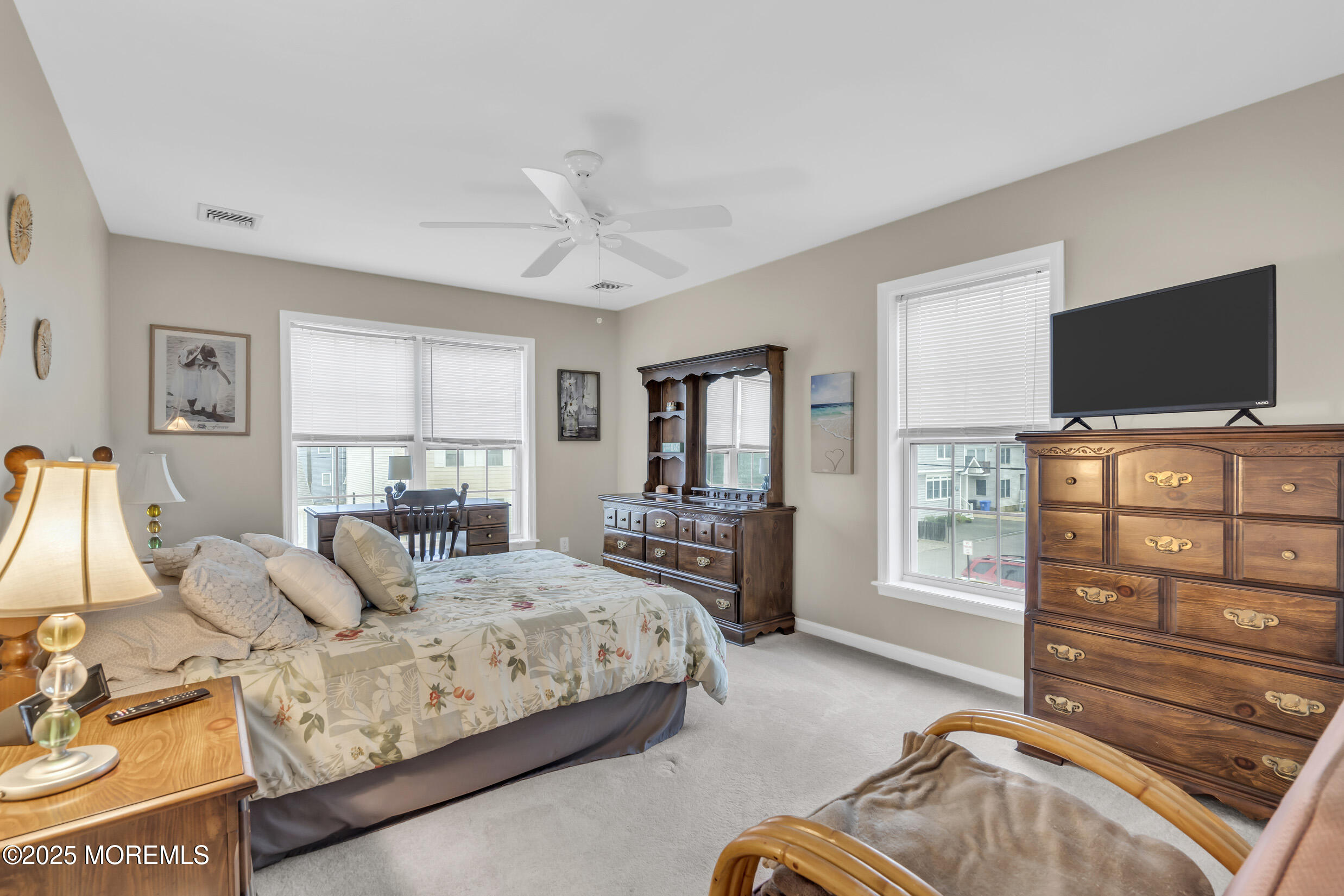 30 South Surf Road Lavallette, NJ 08735 - Photo 17 of 19 a bedroom with a bed and a flat screen tv