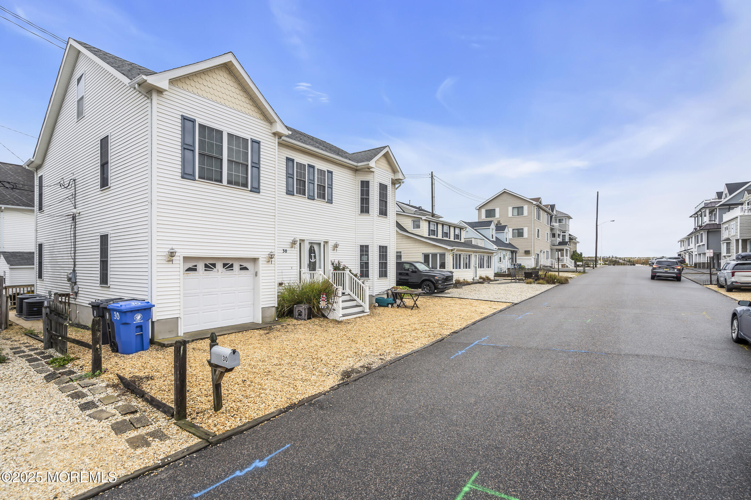 30 South Surf Road Lavallette, NJ 08735 - Photo 3 of 19 a front view of a house with garden