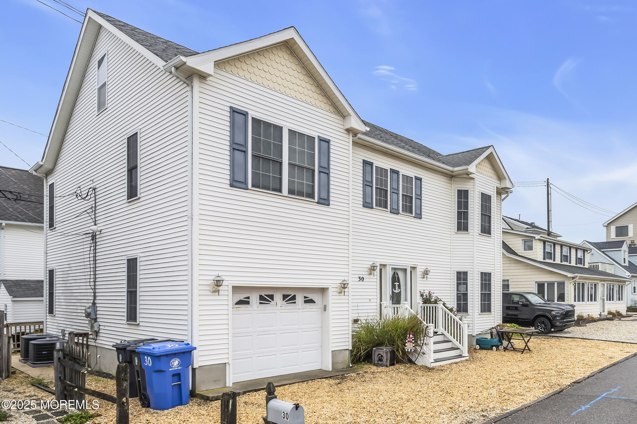 30 South Surf Road Lavallette, NJ 08735 - Photo 4 of 19 a front view of a house with balcony