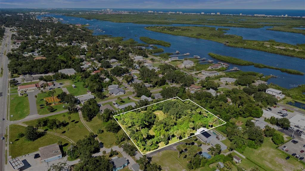 Wilkinson Avenue Edgewater, FL 32132 - Photo 11 of 12 a view of a city with a lake view