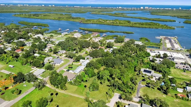 a view of a city with an ocean view