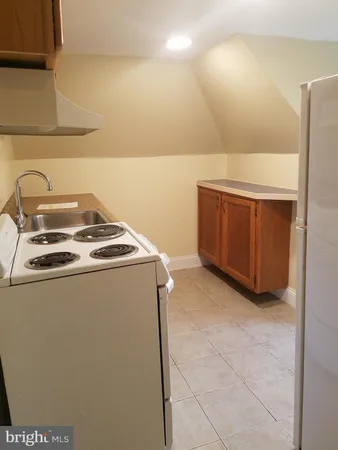 a utility room with washer and dryer