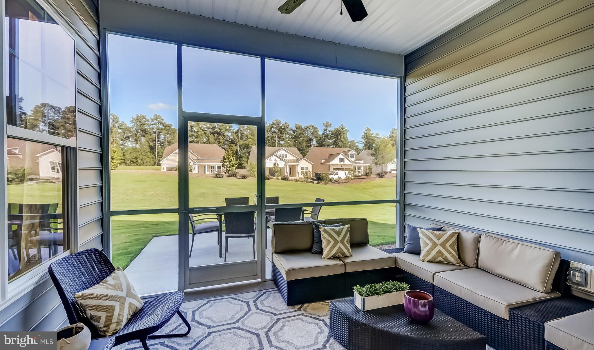 19150 Chartres Street Lewes, DE 19958 - Photo 8 of 12 a balcony with furniture and a potted plant
