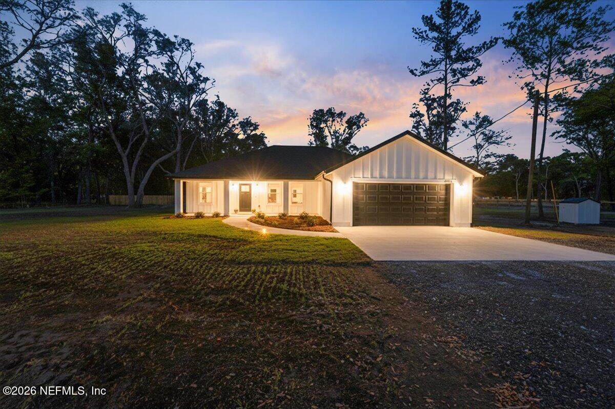 6093 Taylor Road Jacksonville, FL 32234 - Photo 2 of 44 a view of house with backyard