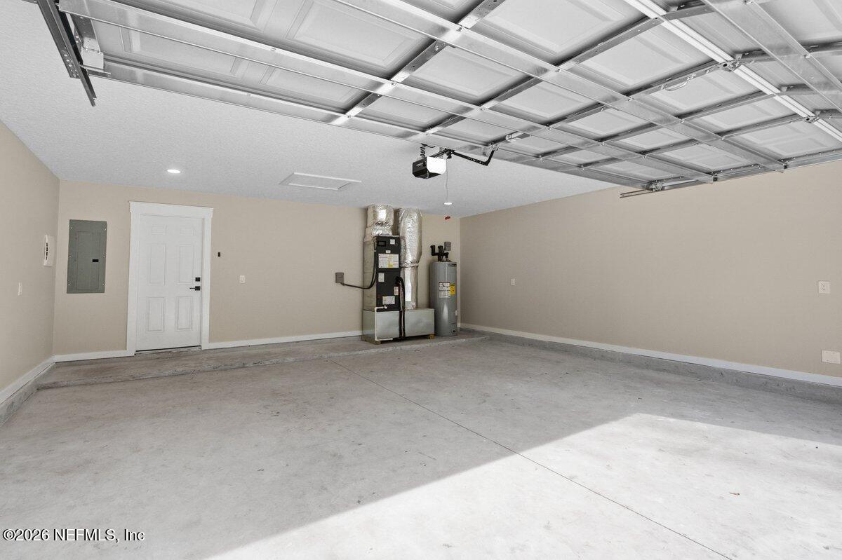 6093 Taylor Road Jacksonville, FL 32234 - Photo 31 of 44 a view of empty room with wooden ceiling