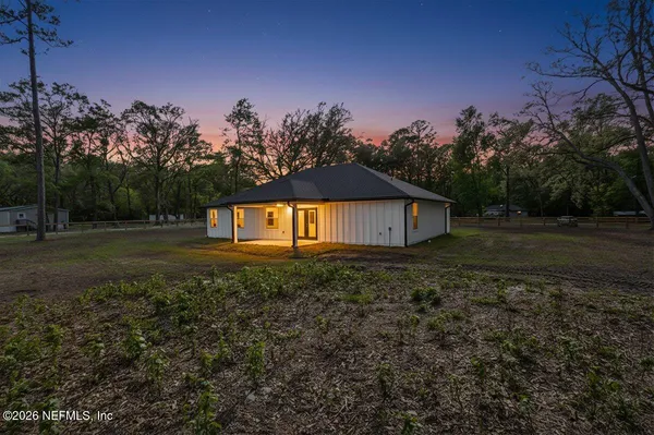 a view of house with outdoor space