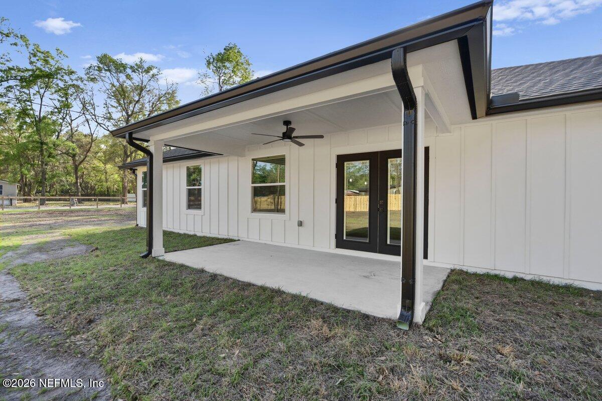 6093 Taylor Road Jacksonville, FL 32234 - Photo 37 of 44 a view of a house with backyard and garden