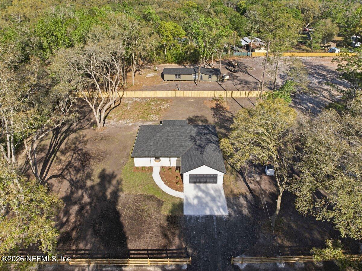 6093 Taylor Road Jacksonville, FL 32234 - Photo 39 of 44 a view of residential houses with outdoor space