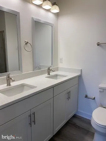 a bathroom with a sink and a toilet