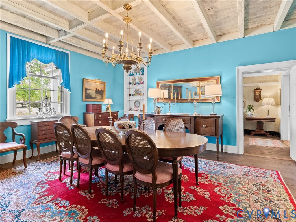 2625 Old Tavern Road Powhatan, VA 23139 - Photo 15 of 100 a view of a dining room with furniture and chandelier